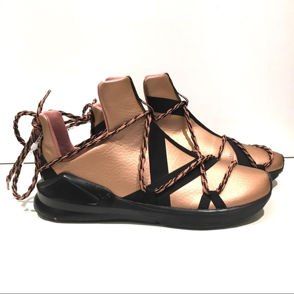 black and gold puma high tops